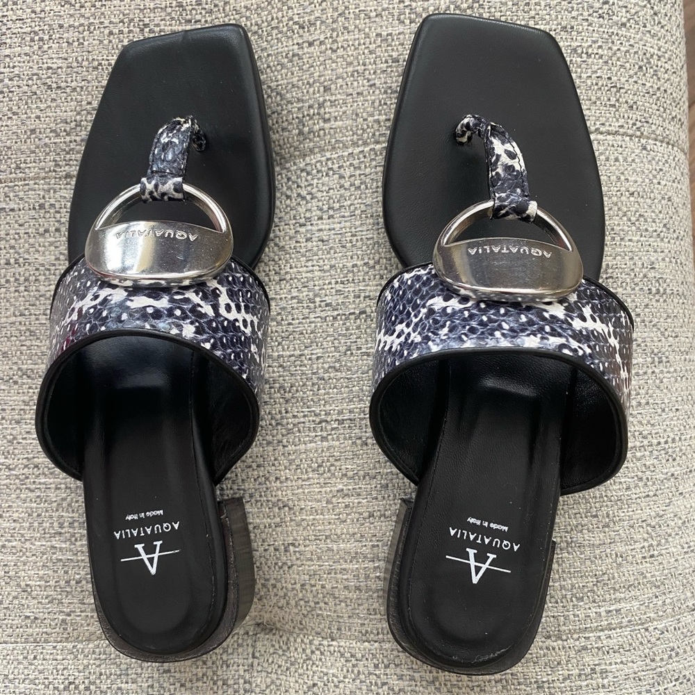Brand new size 7 Aquatalia thong snake print sandals. 1” heel.